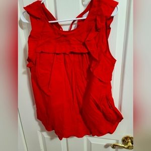 Red sleeveless blouse